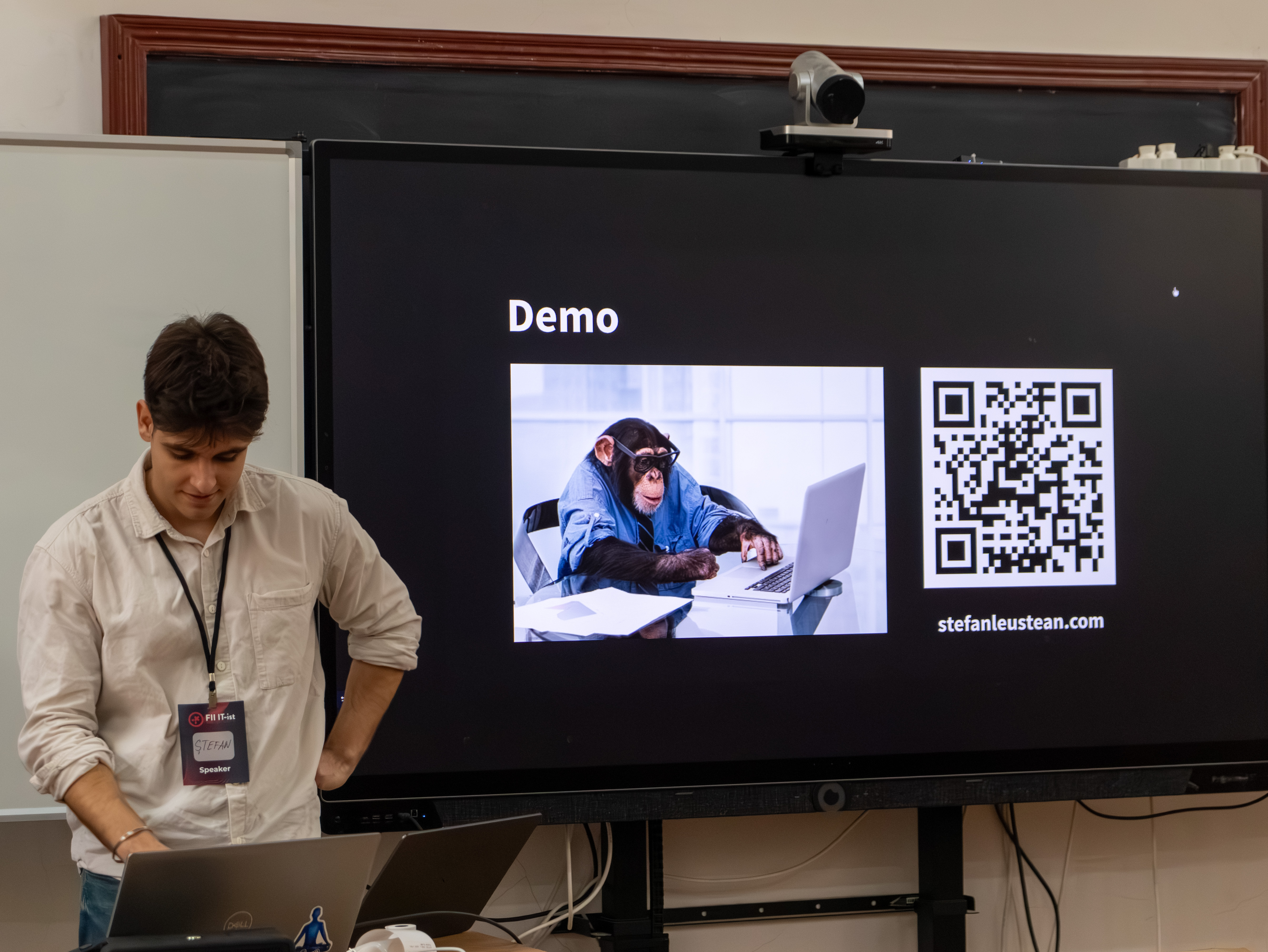 Stefan Leustean presenting at Fii IT-ist tech conference - AWS Lambda and IoT demonstration